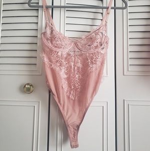Pink lace bodysuit